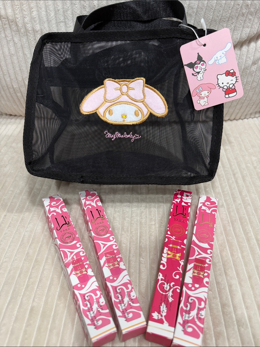 YARA Bundle of Four (4) Asst.35 ML. Fragrances w/My Melody Black Mesh Zipper Bag
